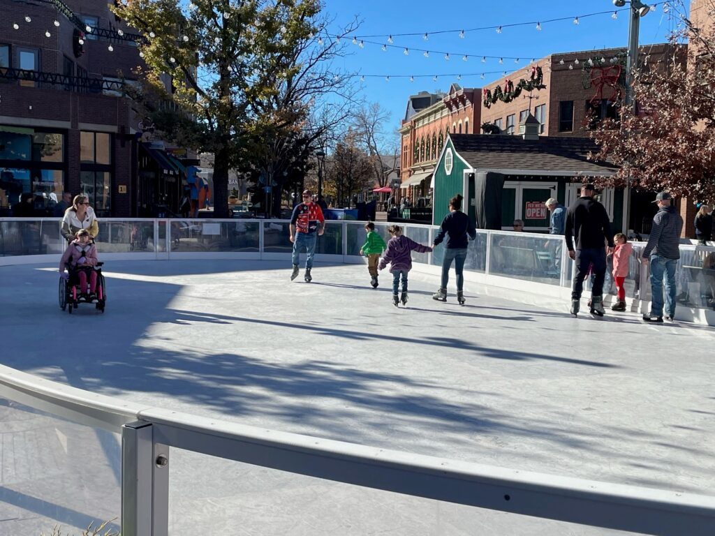 Kids and parents enjoying skating in Old Town Square