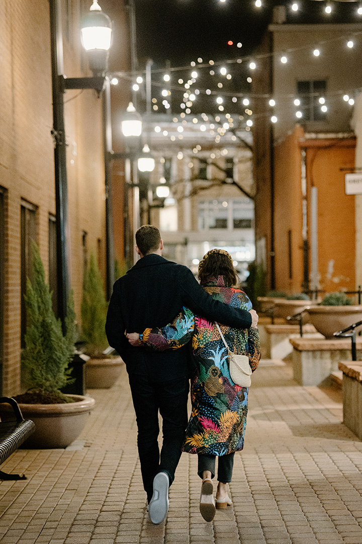 couple walking in rehabilitated alley in downtown fort collins