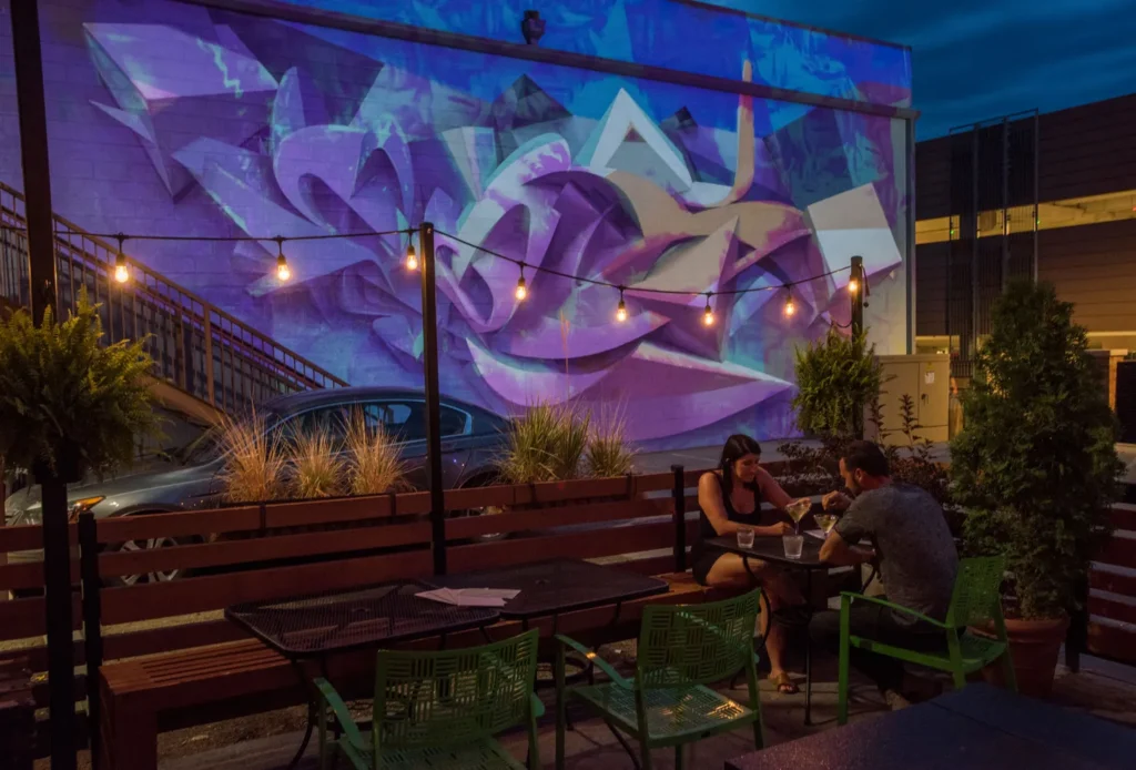 Patio Mural at night in downtown fort collins