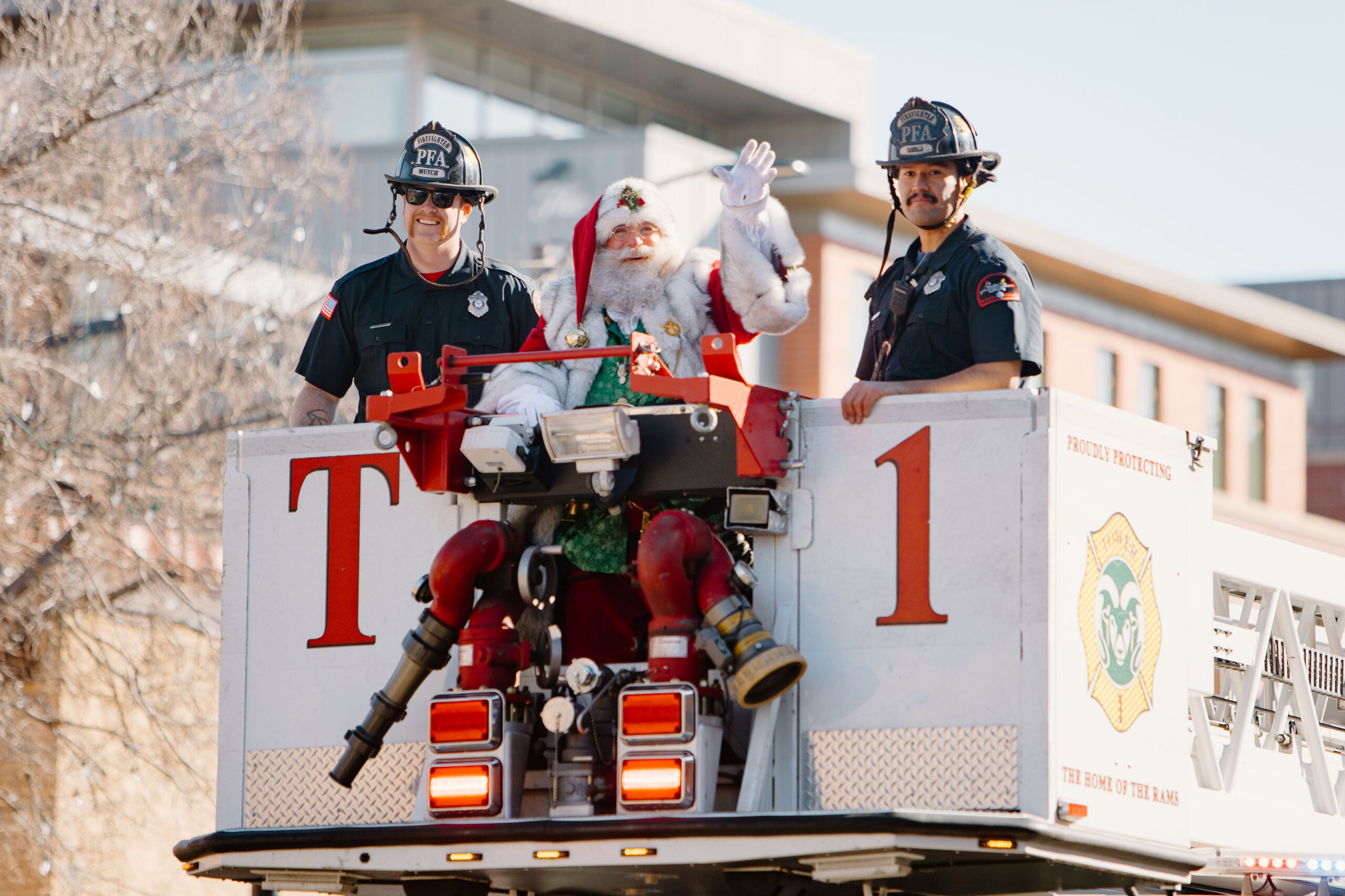 Santa arriving in Downtown Fort Collins by firetruck-credit natalie dyer-2024
